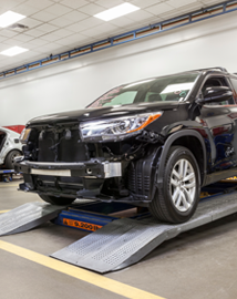 Toyota on vehicle lift | Passport Toyota in Suitland MD