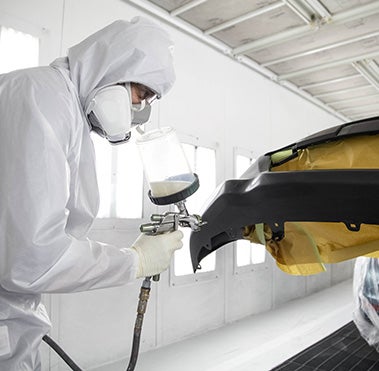Collision Center Technician Painting a Vehicle | Passport Toyota in Suitland MD